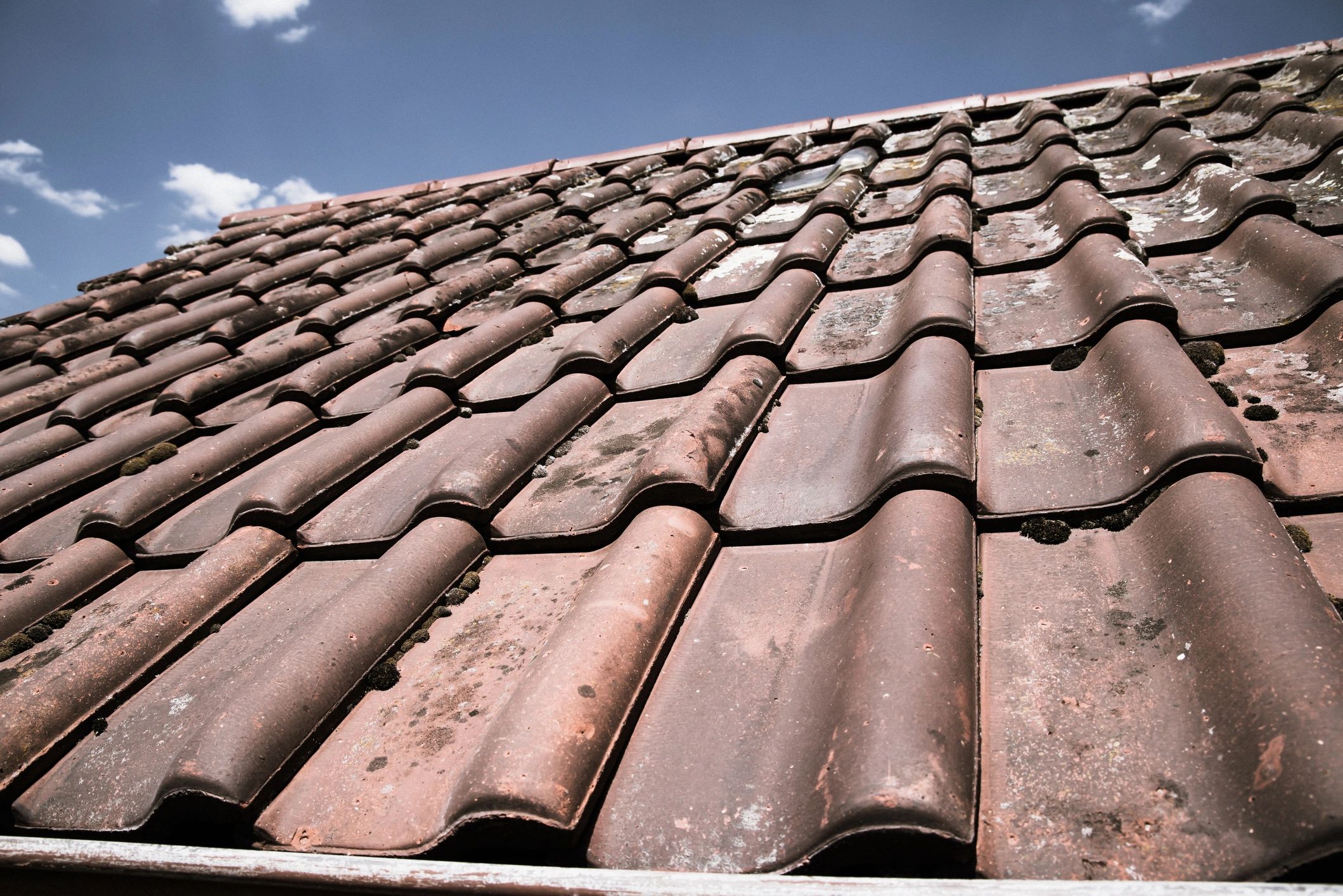 Residential roof viewed after storm conditions